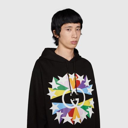 GUC Interlocking G star burst print cotton Hoodie - Styledistrict